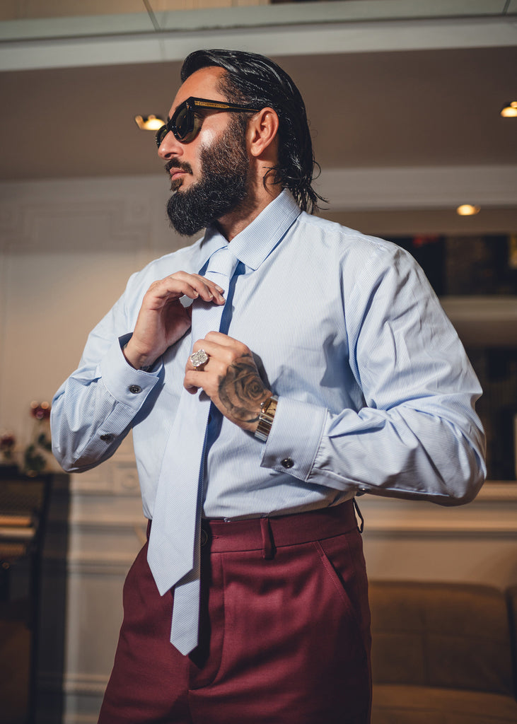Blue shirt with white stripes